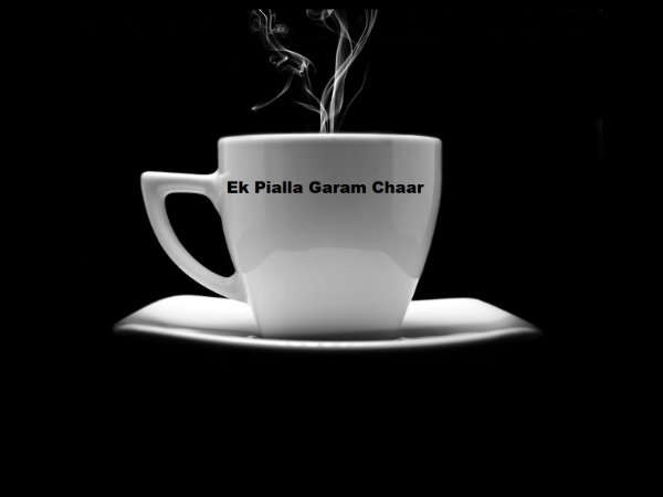 Cup and saucer with hot steaming tea