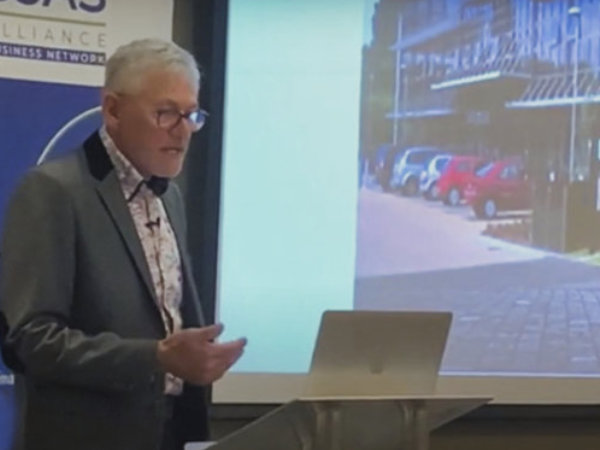 Neville speaking at a mentoring event