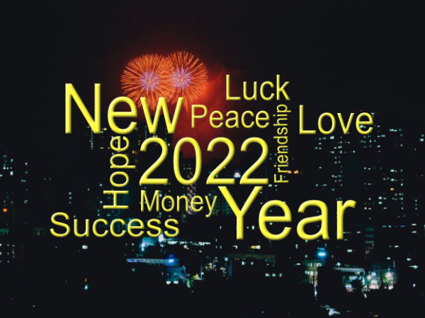 New year 2022 image showing building with fireworks and happy new year greeting