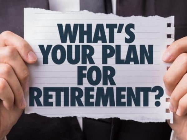 Man holding paper saying What's your plan for Retirement