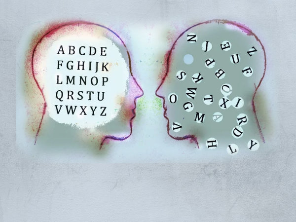 Two opposing heades with alphabet letting as brains