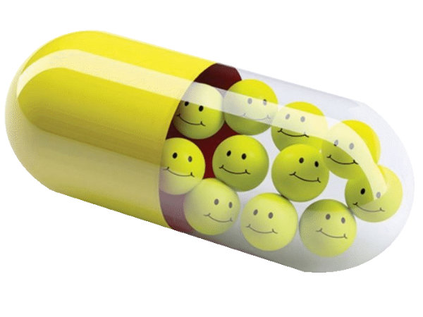 pill with smiling emotes inside