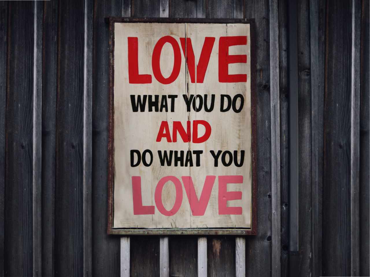 Sign with words love what you do and do what you love